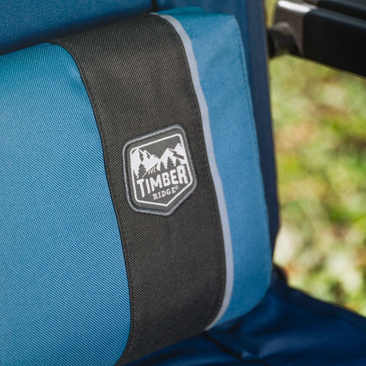 Lifestyle image of the Timber Ridge logo on the Zero Gravity Lounger Lifestyle image of the Timber Ridge logo on the Zero Gravity Lounger