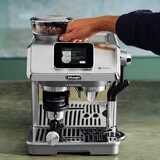 Lifestyle images of De'Longhi La Specialista Touch Coffee Machine on a kitchen countertop Lifestyle images of De'Longhi La Specialista Touch Coffee Machine on a kitchen countertop