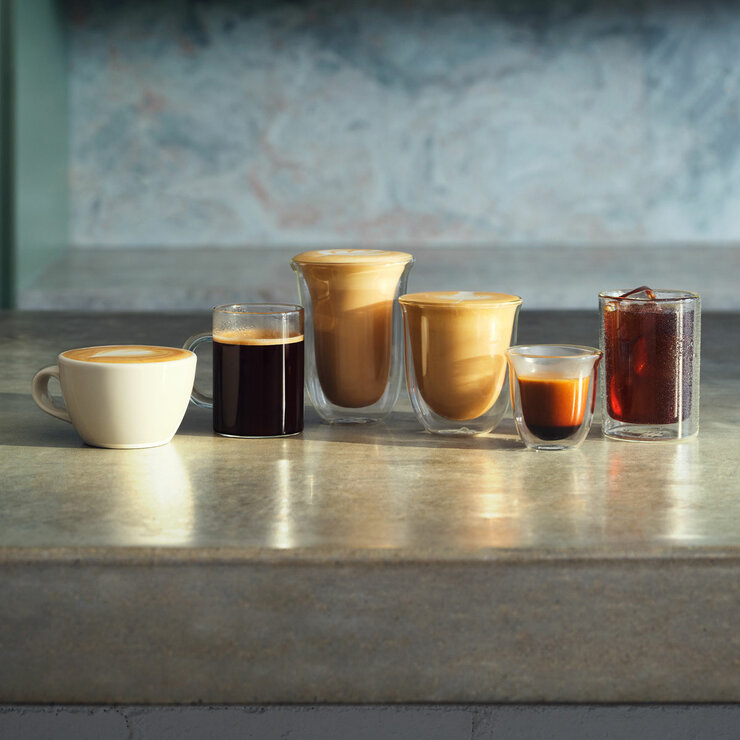 Lifestyle images of various coffess made on a kitchen countertop Lifestyle images of various coffess made on a kitchen countertop