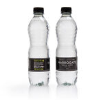 Cut out image of two bottles on white background front facing