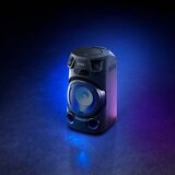 Speaker in dark with lights