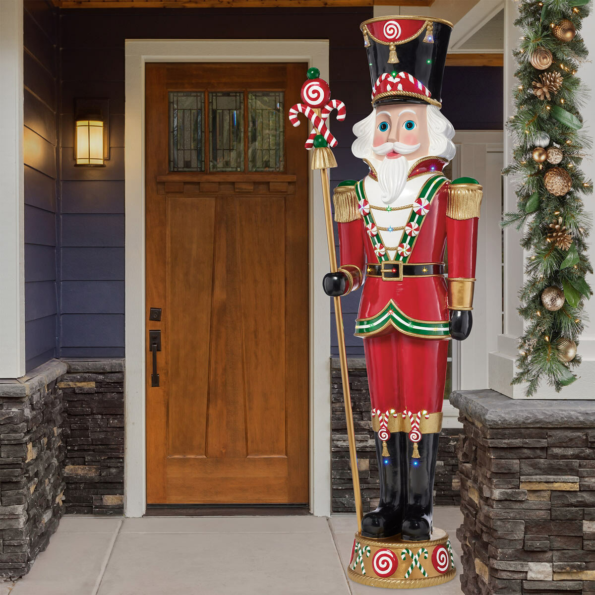 Pre-lit Resin Candy Cane Nutcracker with 42 color LED and Music Pre-lit Resin Candy Cane Nutcracker with 42 color LED and Music