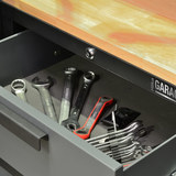Image of open drawer with tools inside