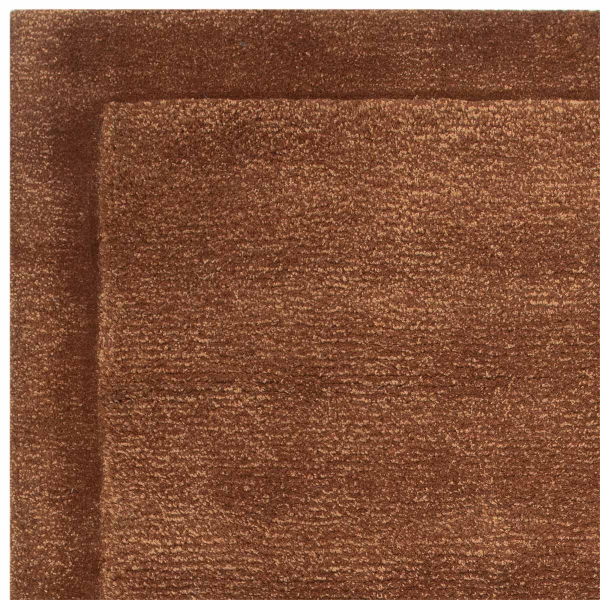 Asiatic Rise border rug in rust