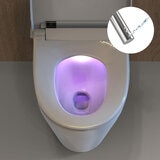 Lifestyle image of Vovo smart toilet seat demonstrating UV light and water nozzle function