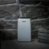 Lifestyle image of Woods Dehumidifier in basement