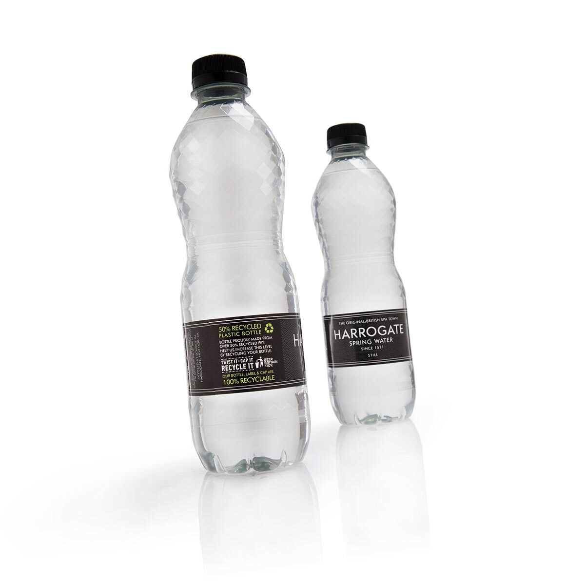 Cut out image of two bottles on white background angled