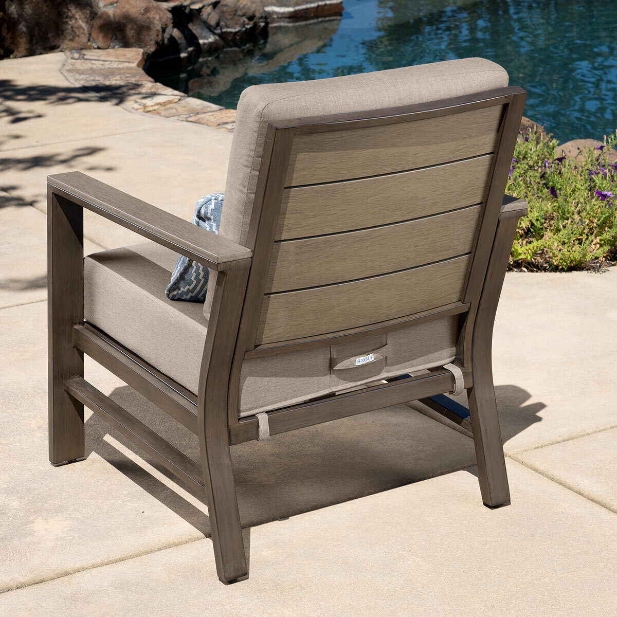 Lounge chair with synthetic wood back