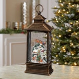 Buy Holiday Scene Lantern Village Lifestyle Image at Costco.co.uk