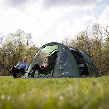 Lifestyle image of people sat under the tent canopy Lifestyle image of people sat under the tent canopy
