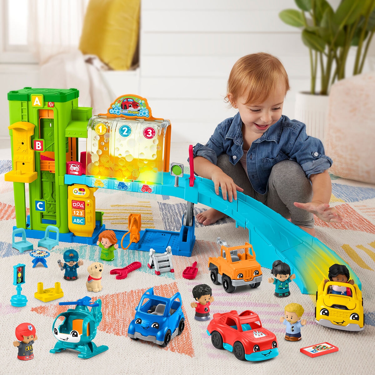 Little People Smart Stage Garage Bundle Lifestyle Image