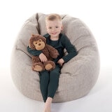 Boy Sitting Holding Monkey