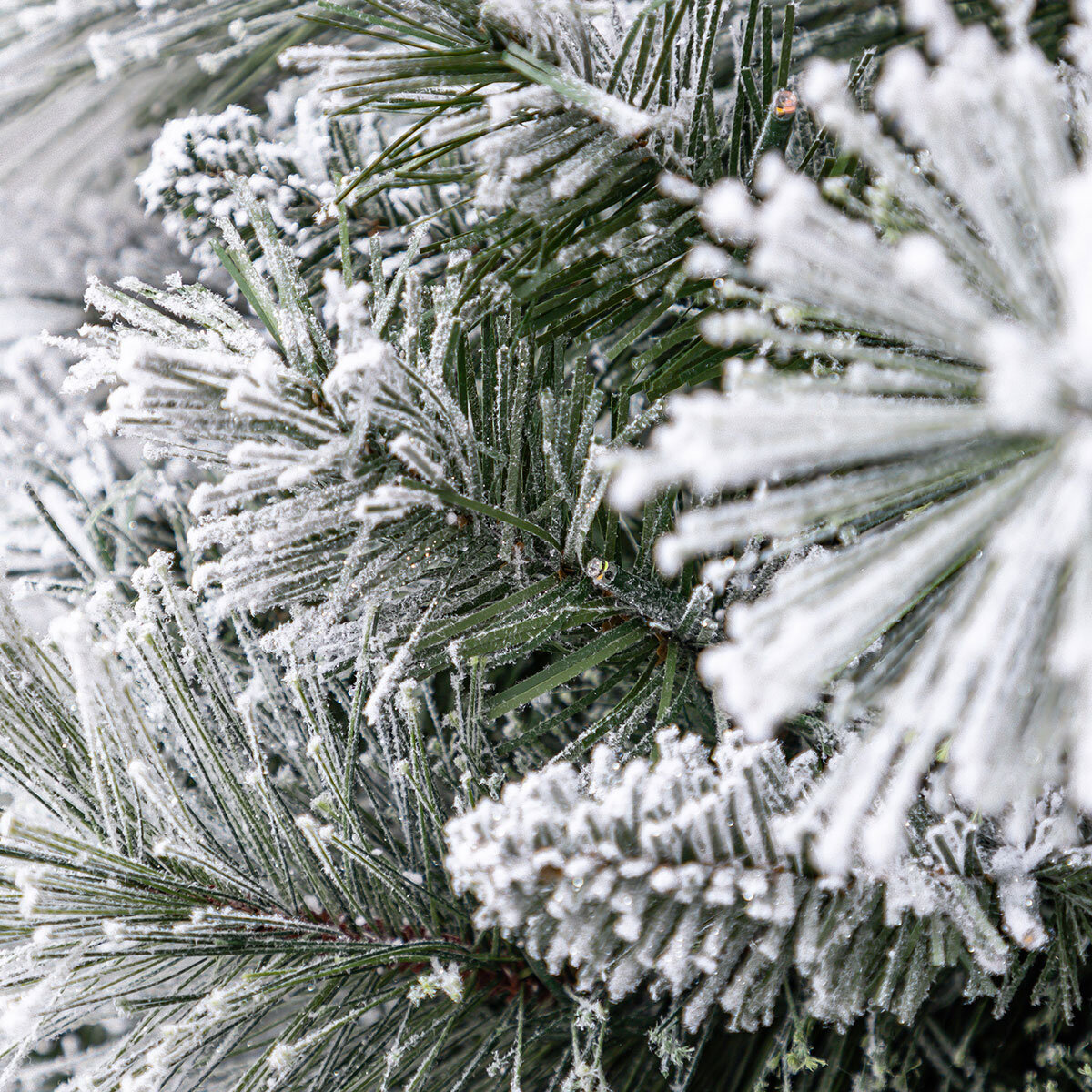 Buy 4.5ft Pre-lit Glitter Flocked Potted Tree Close up Image 2 at costco.co.uk