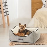 KS Rectangular Nuzzler brown dog bed with dog