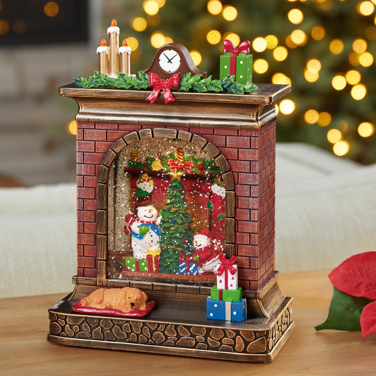 Buy 10.25" Fireplace Water Globe Snowman with Christmas Tree Lifestyle image at costco.co.uk