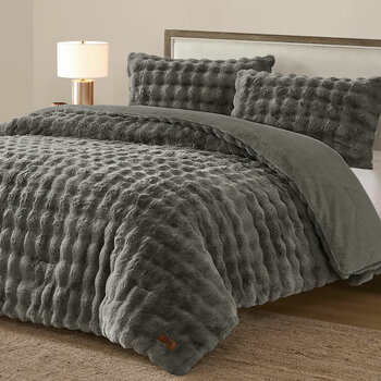 3 piece grey bubble faux fur comforter set, including two decorative pillows. 3 piece grey bubble faux fur comforter set, including two decorative pillows.