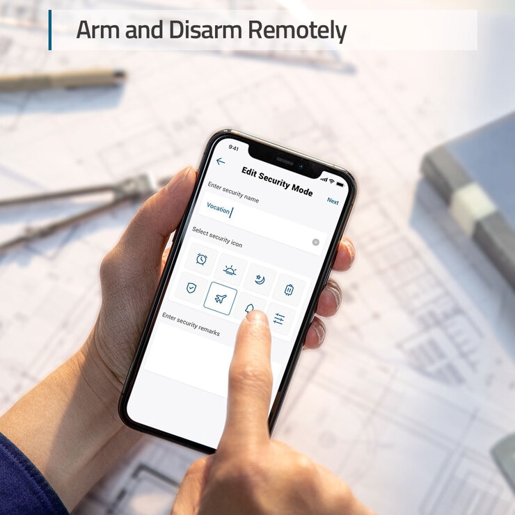 Lifestyle image showing alarm kit being diarmed remotely Lifestyle image showing alarm kit being diarmed remotely