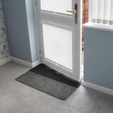 Lifestyle image of mat in doorway