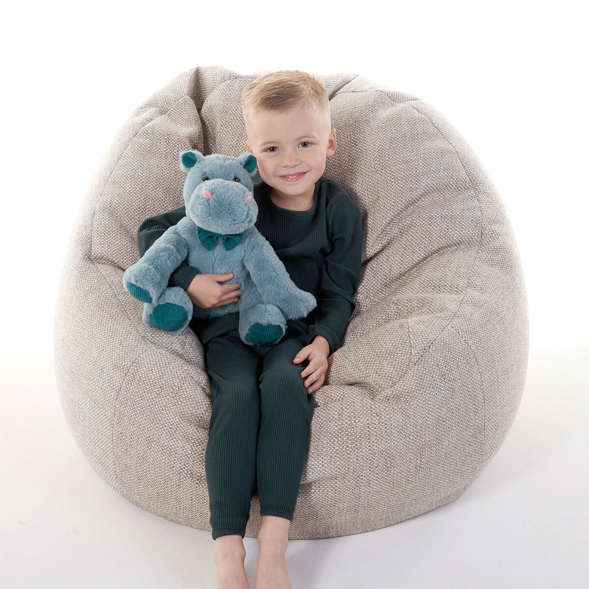 Boy Sitting Holding Hippo