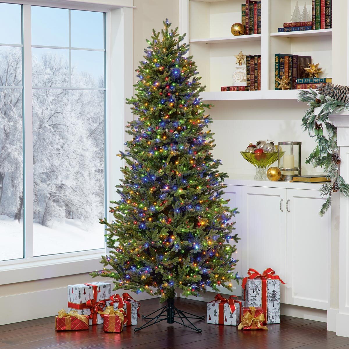 Buy 6.5ft Pre-lit Slim Aspen Tree Lifestyle Image 1 at costco.co.uk