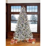 Buy 7.5ft Pre-Lit Glitter Flocked Aspen Tree Lifestyle2 Image at Costco.co.uk