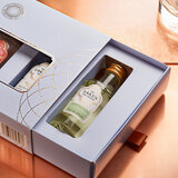 Close up of gift pack open showing elderflower gin