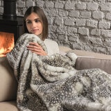 Dreamland faux fur heated throw in fallow deer design