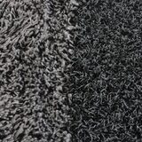 Close up image of mat where two colours meet