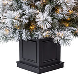 Buy 4.5ft Pre-lit Glitter Flocked Potted Tree Close up Image 1 at costco.co.uk