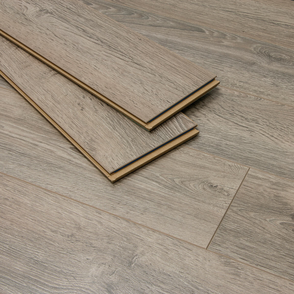 Close up image of laid floor with planks on top