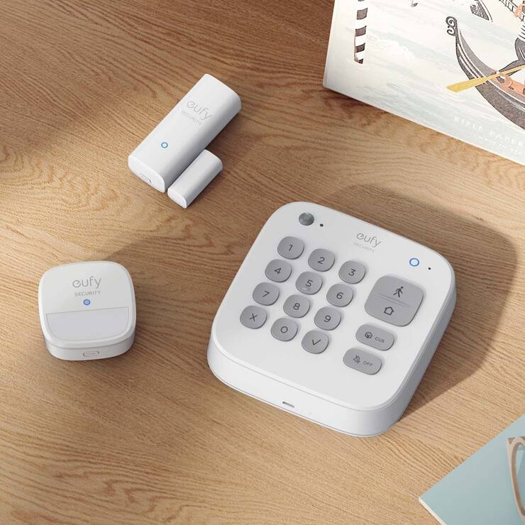 Lifestyle image of keypad and components on table Lifestyle image of keypad and components on table