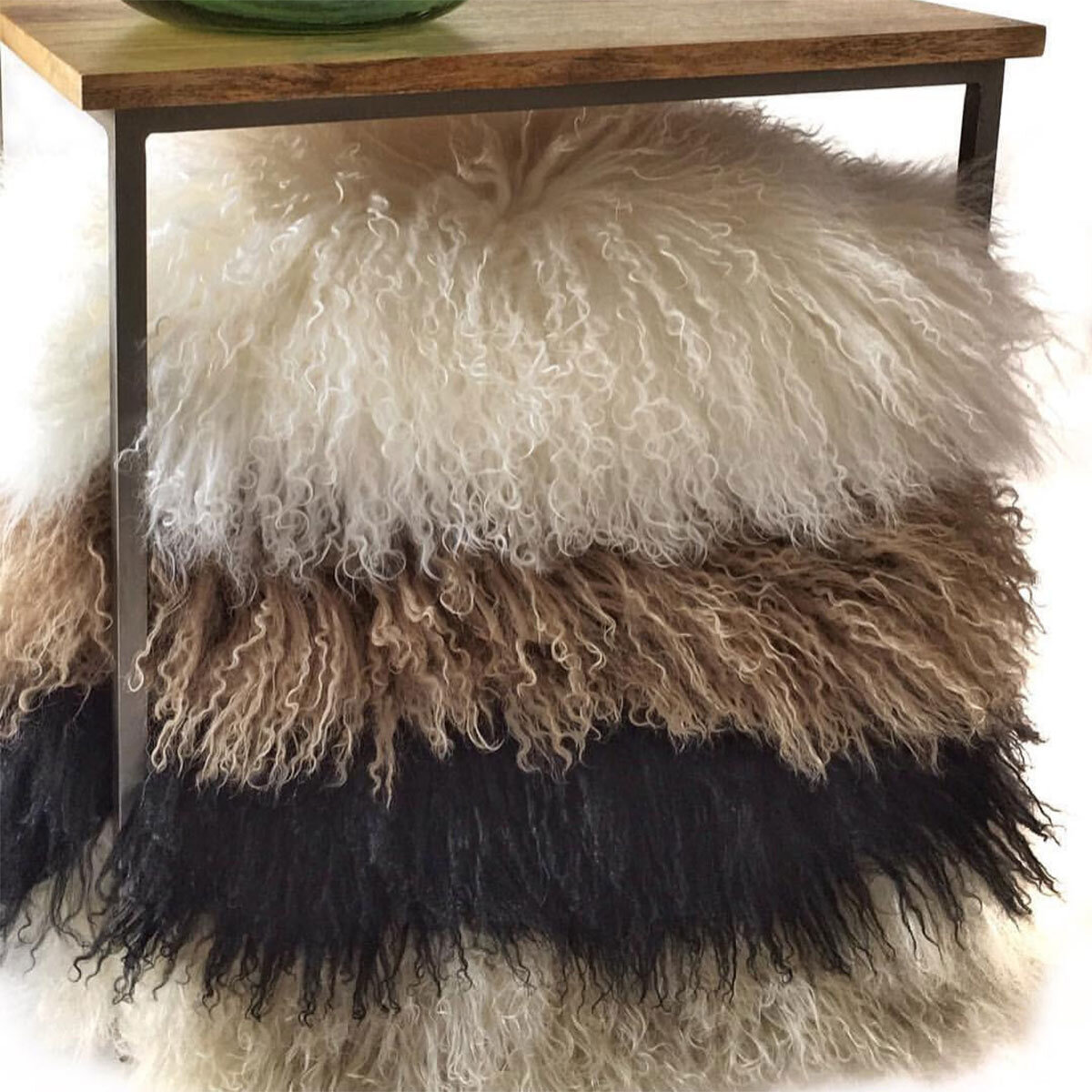 Naturally Sheepskin Mongolian Cushion showing all 4 colours