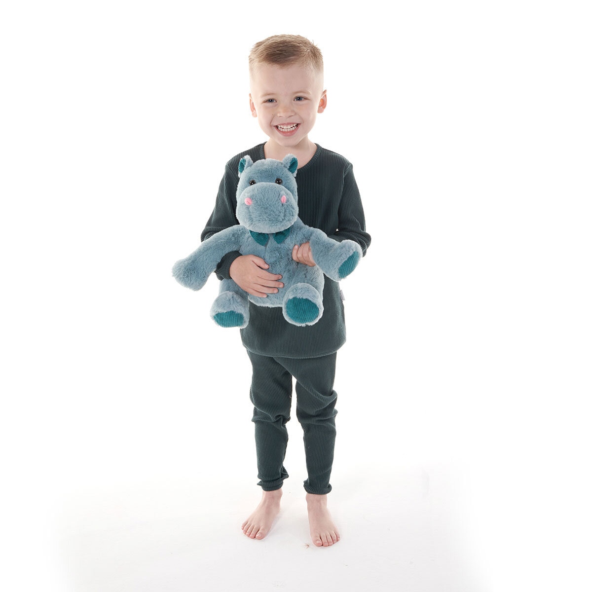 Boy Standing Holding Hippo