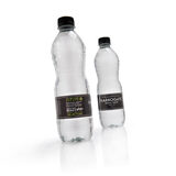 Cut out image of two bottles on white background angled