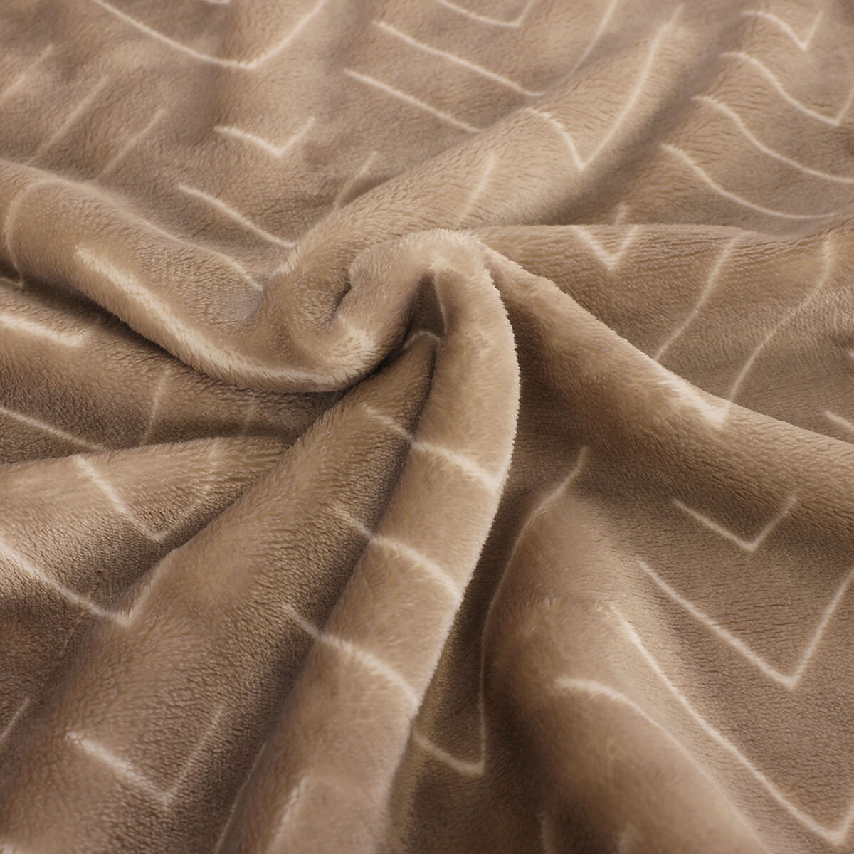 close up of material of taupe geo printed plush throw