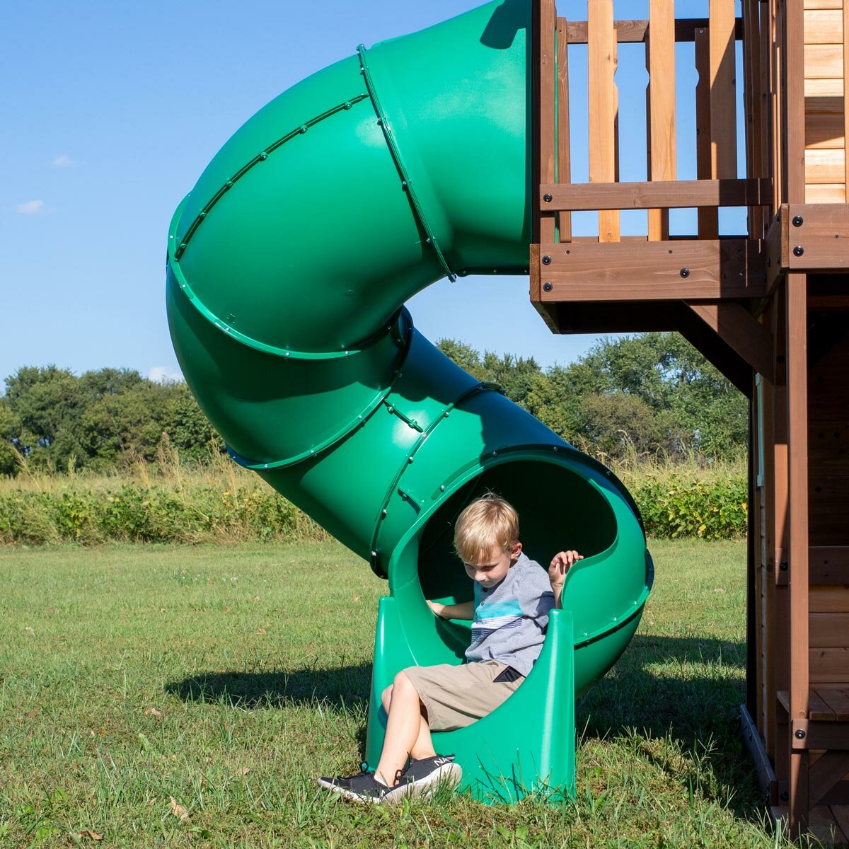 Lifestyle image of a child going down the slide Lifestyle image of a child going down the slide