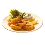 Lifestyle image of Panko breaded squid rings on a plate with Garnish