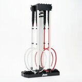 Studio image of the badminton base folded down and the rackets stood inside it. Studio image of the badminton base folded down and the rackets stood inside it.