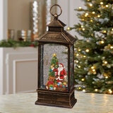 Buy Holiday Scene Lantern Santa Lifestyle Image at Costco.co.uk