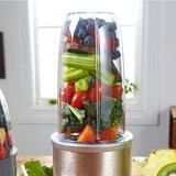 Lifestyle image of Nutribullet 900 with fruit